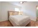 Bright bedroom with a comfy bed and wood floors at 2021 W Osborn Rd, Phoenix, AZ 85015