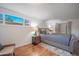 Main bedroom with hardwood floors and built-in shelving at 2021 W Osborn Rd, Phoenix, AZ 85015