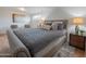 Spacious bedroom with plush bed and modern decor at 2021 W Osborn Rd, Phoenix, AZ 85015