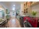 Kitchen with updated cabinetry, a red washer, and dryer at 2021 W Osborn Rd, Phoenix, AZ 85015