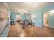 Light and airy living room with tiled floors and a view of the kitchen at 2021 W Osborn Rd, Phoenix, AZ 85015