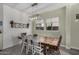 Farmhouse style dining room with wooden table and chairs at 22811 E Stacey Rd, Queen Creek, AZ 85142