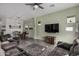 Open concept dining room with rustic wooden table at 22811 E Stacey Rd, Queen Creek, AZ 85142