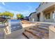 Outdoor kitchen with built-in grill and stone steps at 2322 E Samantha Way, Phoenix, AZ 85042