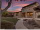 Stunning home exterior at sunset, showcasing a beautiful backyard at 2322 E Samantha Way, Phoenix, AZ 85042