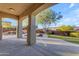 Covered patio overlooking a tranquil backyard with pool at 2322 E Samantha Way, Phoenix, AZ 85042