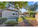 Expansive backyard with sandpit and manicured lawn at 2322 E Samantha Way, Phoenix, AZ 85042