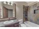 Bathroom with tub, shower and wood vanity at 2322 E Samantha Way, Phoenix, AZ 85042