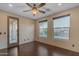 Bright bedroom with hardwood floors and French door at 2322 E Samantha Way, Phoenix, AZ 85042