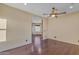 Bedroom with hardwood floors and access to another room at 2322 E Samantha Way, Phoenix, AZ 85042