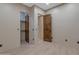 Bedroom with light walls, wood-look flooring, and walk-in closet at 2322 E Samantha Way, Phoenix, AZ 85042