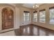 Inviting entryway with a wooden door and tile flooring at 2322 E Samantha Way, Phoenix, AZ 85042