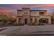 Stunning two-story house with stone facade and landscaped yard at 2322 E Samantha Way, Phoenix, AZ 85042