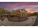 Two-story home with arched entryway and landscaped yard at 2322 E Samantha Way, Phoenix, AZ 85042