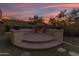 Elegant outdoor fire pit with brick flooring at 2322 E Samantha Way, Phoenix, AZ 85042