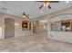 Open and bright Gathering room with tile flooring and ceiling fan at 2322 E Samantha Way, Phoenix, AZ 85042