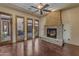 Living room with hardwood floors, fireplace and access to backyard at 2322 E Samantha Way, Phoenix, AZ 85042