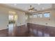 Large main bedroom with hardwood floors and ensuite bathroom access at 2322 E Samantha Way, Phoenix, AZ 85042