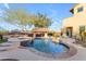 Resort-style pool with a fire pit and patio at 2322 E Samantha Way, Phoenix, AZ 85042