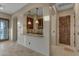 Wet bar with granite countertop and wood cabinetry at 2322 E Samantha Way, Phoenix, AZ 85042