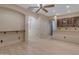 Basement wet bar with granite countertop and glass-front cabinetry at 2322 E Samantha Way, Phoenix, AZ 85042