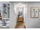 Bright entryway with built-in shelving and wood flooring at 2749 E Pearl St, Mesa, AZ 85213