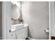 Modern powder room with white vanity and elegant fixtures at 2749 E Pearl St, Mesa, AZ 85213