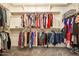 Large walk-in closet with ample hanging space and shelving at 2749 E Pearl St, Mesa, AZ 85213