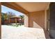 Covered patio with checkered turf and pergola at 3943 E Canyon Pl, Chandler, AZ 85249