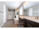 Elegant bathroom with double vanity, soaking tub, and walk-in shower at 3943 E Canyon Pl, Chandler, AZ 85249