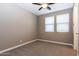 Well-lit bedroom featuring two windows with blinds at 3943 E Canyon Pl, Chandler, AZ 85249