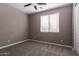 Spacious bedroom with carpeted floors and ceiling fan at 3943 E Canyon Pl, Chandler, AZ 85249