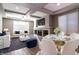 Bright living room with a glass dining table and modern decor at 3943 E Canyon Pl, Chandler, AZ 85249