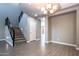 Modern staircase with metal railing leading to upper level at 3943 E Canyon Pl, Chandler, AZ 85249