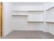 Large walk-in closet with ample shelving and hanging space at 3943 E Canyon Pl, Chandler, AZ 85249