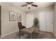 Neutral bedroom featuring a stylish ceiling fan and decoratively framed art at 4329 W Sierra St, Glendale, AZ 85304