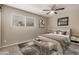 Bedroom with cozy seating, a bright window, and neutral decor at 4329 W Sierra St, Glendale, AZ 85304