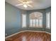 Inviting bedroom features a ceiling fan, and beautiful hardwood floors at 7143 E Canyon Wren Dr, Gold Canyon, AZ 85118