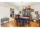 Dining area with hardwood floors and a view into the kitchen at 7341 E Sutton Dr, Scottsdale, AZ 85260