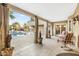 Relaxing patio with seating area, adjacent to a sparkling pool at 7341 E Sutton Dr, Scottsdale, AZ 85260