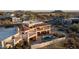 Aerial view of a two-story home with a pool and spa at 8540 E Mcdowell Rd # 121, Mesa, AZ 85207