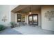 Inviting entryway featuring double doors and decorative wall art at 8540 E Mcdowell Rd # 121, Mesa, AZ 85207