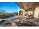 Covered patio with seating and pool views at 8540 E Mcdowell Rd # 121, Mesa, AZ 85207