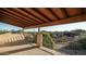 Covered patio with scenic views and wrought iron railing at 8540 E Mcdowell Rd # 121, Mesa, AZ 85207