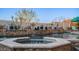 Octagonal spa surrounded by cascading water features at 8540 E Mcdowell Rd # 121, Mesa, AZ 85207