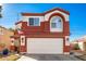 Two-story house with a large garage and landscaping at 12001 W Granada Rd, Avondale, AZ 85392