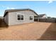 Backyard featuring stucco exterior, block wall and patio at 17703 W Southgate Ave, Goodyear, AZ 85338