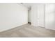An empty bedroom with carpet flooring and white walls is move-in ready at 17703 W Southgate Ave, Goodyear, AZ 85338