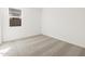 The carpeted bedroom features a double-paned window and light-colored walls at 17703 W Southgate Ave, Goodyear, AZ 85338