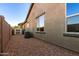 Side yard with a storage shed, gravel, and house AC unit at 20856 E Arroyo Verde Dr, Queen Creek, AZ 85142